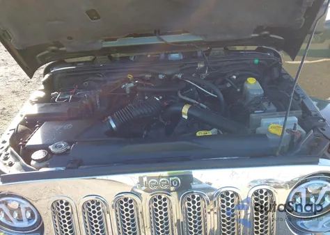 2009 Jeep Wrangler Unlimited Sahara z USA, uszkodzony, nr VIN 1J4GA59189L710032